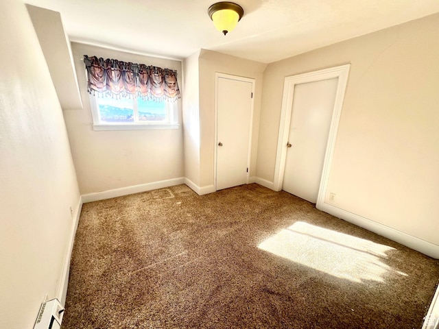 96 W 200 N, Richfield, UT 84701 - unfurnished bedroom with baseboard heating and carpet floors