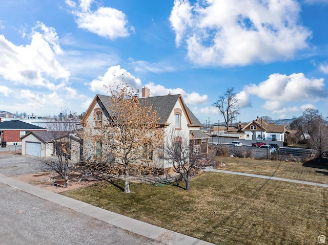96 W 200 N, Richfield, UT 84701 - view of front of home with a garage and a front lawn
