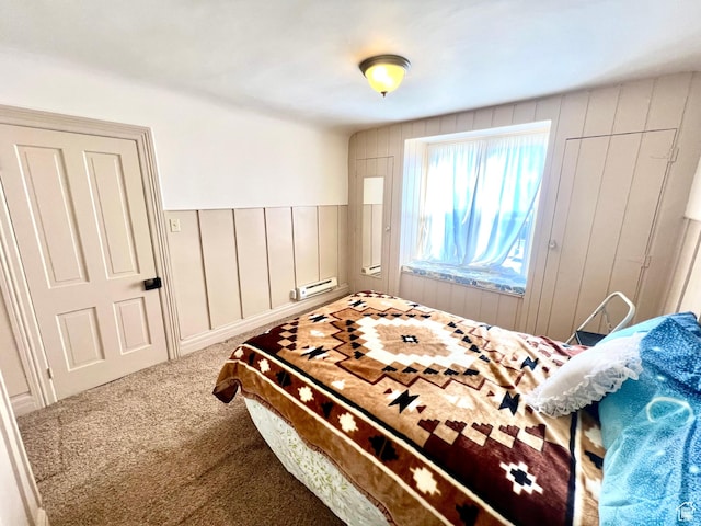 96 W 200 N, Richfield, UT 84701 - carpeted bedroom with wood walls and baseboard heating