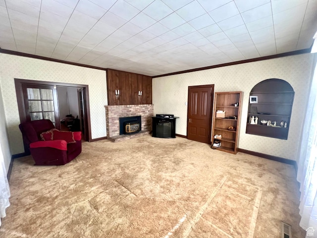 96 W 200 N, Richfield, UT 84701 - carpeted living room featuring built in shelves, a brick fireplace, crown molding, and wood walls