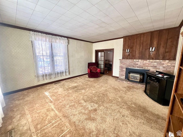 96 W 200 N, Richfield, UT 84701 - unfurnished living room with a fireplace, ornamental molding, wood walls, and carpet flooring