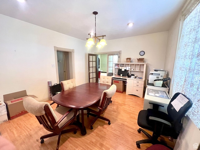 96 W 200 N, Richfield, UT 84701 - dining room with light wood-type flooring and a chandelier
