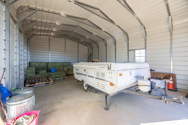 garage featuring a carport