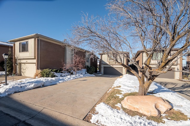 3850 S Quail Hollow Dr E Unit 22, Millcreek, UT 84109 - view of front of house featuring a garage