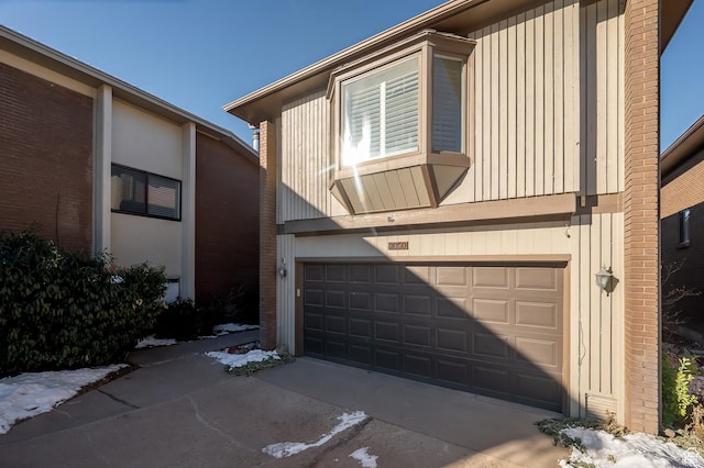 3850 S Quail Hollow Dr E Unit 22, Millcreek, UT 84109 - view of front of home with a garage
