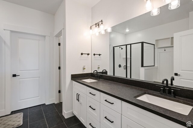 3492 N Delta St, Eagle Mountain, UT 84005 - bathroom with tile patterned flooring, walk in shower, and vanity
