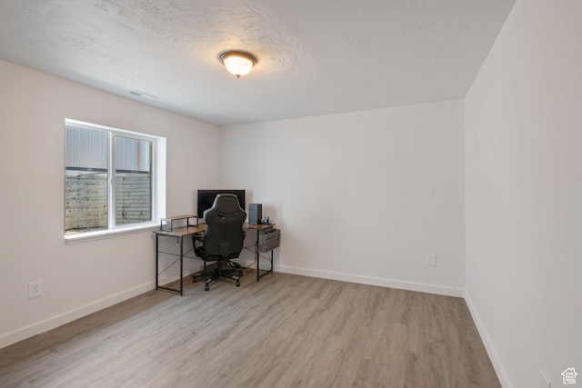 3492 N Delta St, Eagle Mountain, UT 84005 - office with light wood-type flooring and a textured ceiling