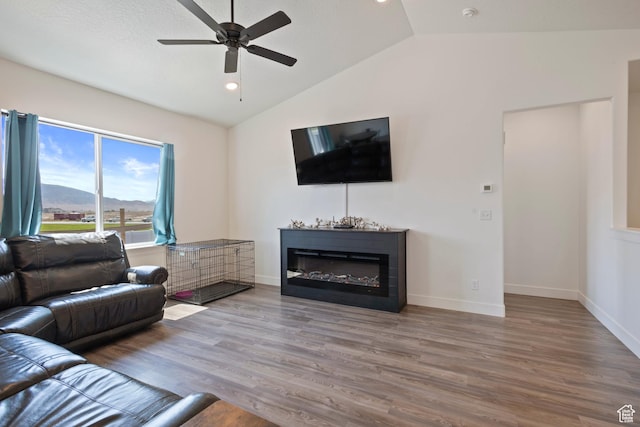 3492 N Delta St, Eagle Mountain, UT 84005 - living room featuring hardwood / wood-style floors, a mountain view, vaulted ceiling, and ceiling fan