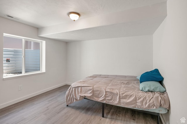 3492 N Delta St, Eagle Mountain, UT 84005 - bedroom with light hardwood / wood-style flooring