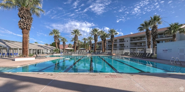 view of pool featuring a patio area