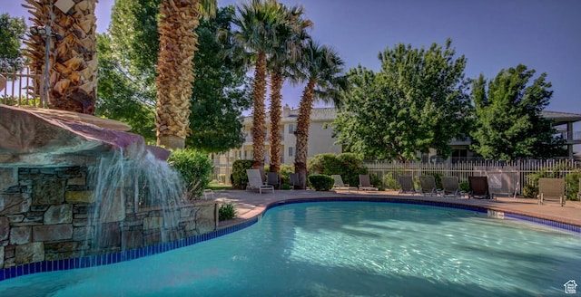view of swimming pool featuring a patio