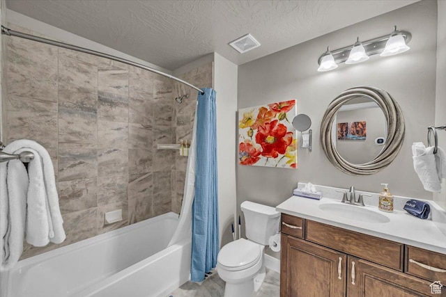 full bathroom with toilet, a textured ceiling, shower / bath combination with curtain, and vanity