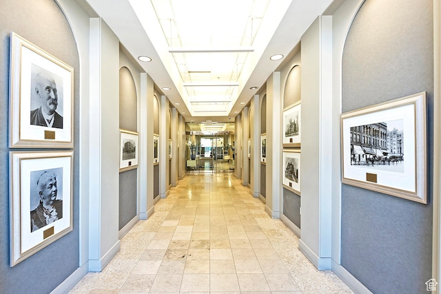 268 S State St E Unit 418, Salt Lake City, UT 84111 - corridor featuring a raised ceiling and light tile patterned flooring