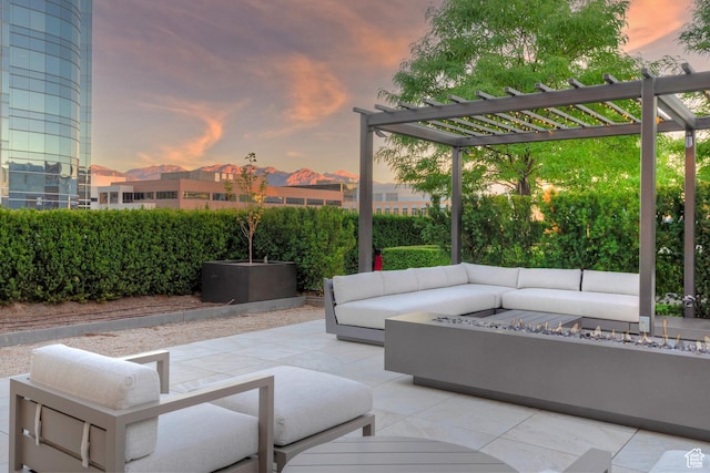 268 S State St E Unit 418, Salt Lake City, UT 84111 - patio terrace at dusk with outdoor lounge area and a pergola