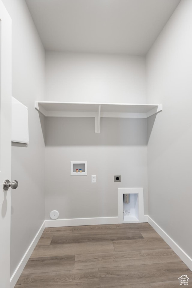 3786 S 4250 W Unit 425, West Haven, UT 84401 - clothes washing area with electric dryer hookup, hookup for a washing machine, wood finished floors, and laundry area