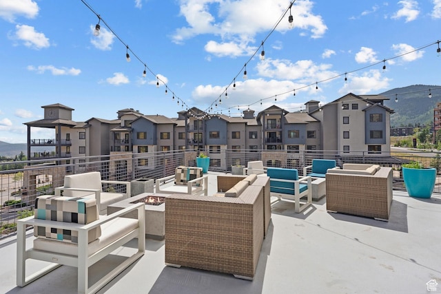 2670 W Canyons Resort Dr Unit 207, Park City, UT 84098 - view of patio / terrace featuring a mountain view and an outdoor living space with a fire pit