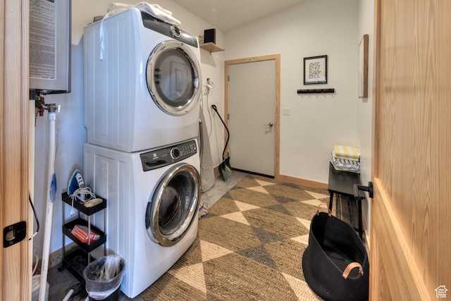 171 E Mt Peale Dr, Moab, UT 84532 - laundry room featuring stacked washer and clothes dryer