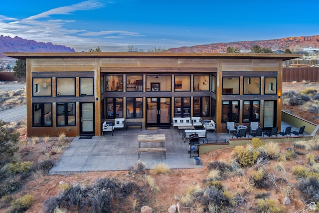 171 E Mt Peale Dr, Moab, UT 84532 - rear view of property featuring a mountain view