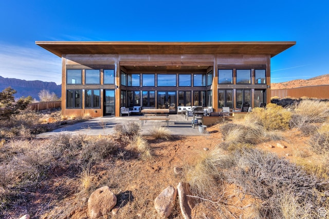 171 E Mt Peale Dr, Moab, UT 84532 - back of property with a mountain view and a patio