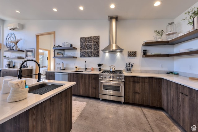 171 E Mt Peale Dr, Moab, UT 84532 - kitchen featuring wall chimney exhaust hood, sink, a wall mounted air conditioner, and appliances with stainless steel finishes