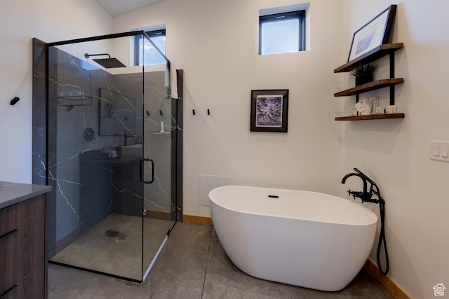 171 E Mt Peale Dr, Moab, UT 84532 - bathroom featuring concrete floors, separate shower and tub, and vanity