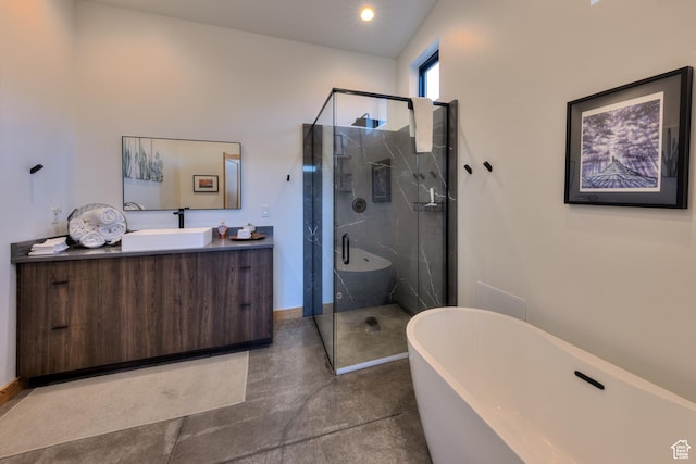 171 E Mt Peale Dr, Moab, UT 84532 - bathroom with vanity, concrete floors, and separate shower and tub