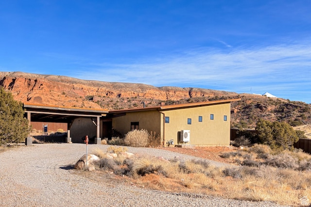 171 E Mt Peale Dr, Moab, UT 84532 - view of front of home with a mountain view