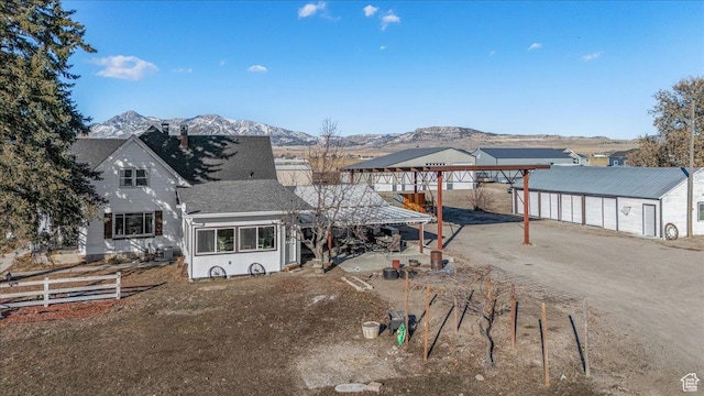 exterior space featuring a mountain view