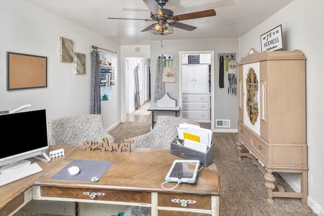 interior space with ceiling fan and carpet flooring