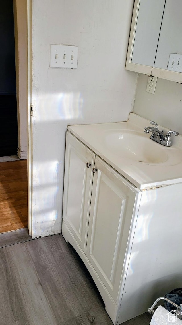 449 E 3rd S, Price, UT 84501 - bathroom with wood finished floors and vanity