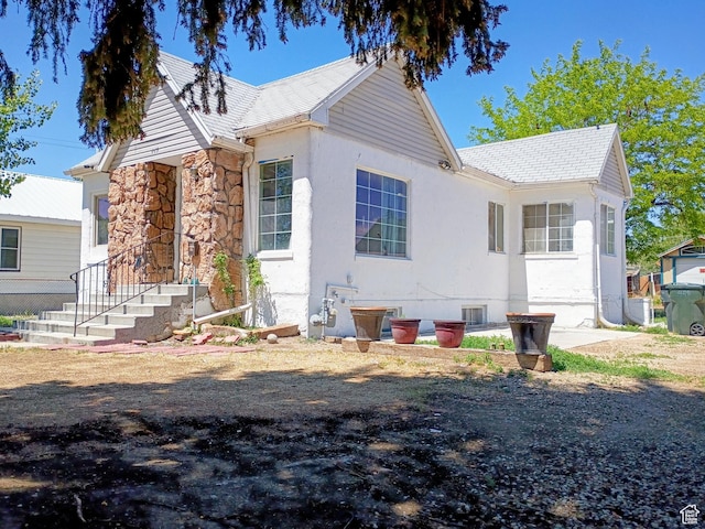 449 E 3rd S, Price, UT 84501 - view of front of property featuring stone siding and stucco siding