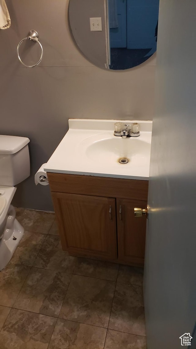 449 E 3rd S, Price, UT 84501 - half bath featuring vanity and toilet