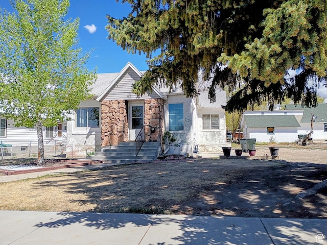 view of front of home featuring stone siding