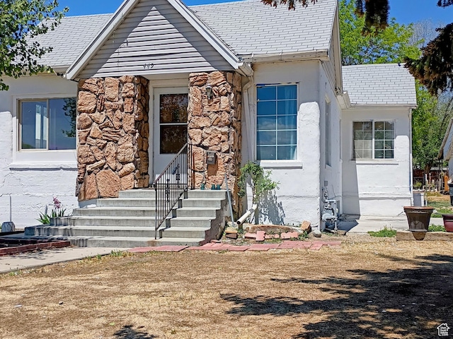 449 E 3rd S, Price, UT 84501 - view of front of property with stucco siding and stone siding