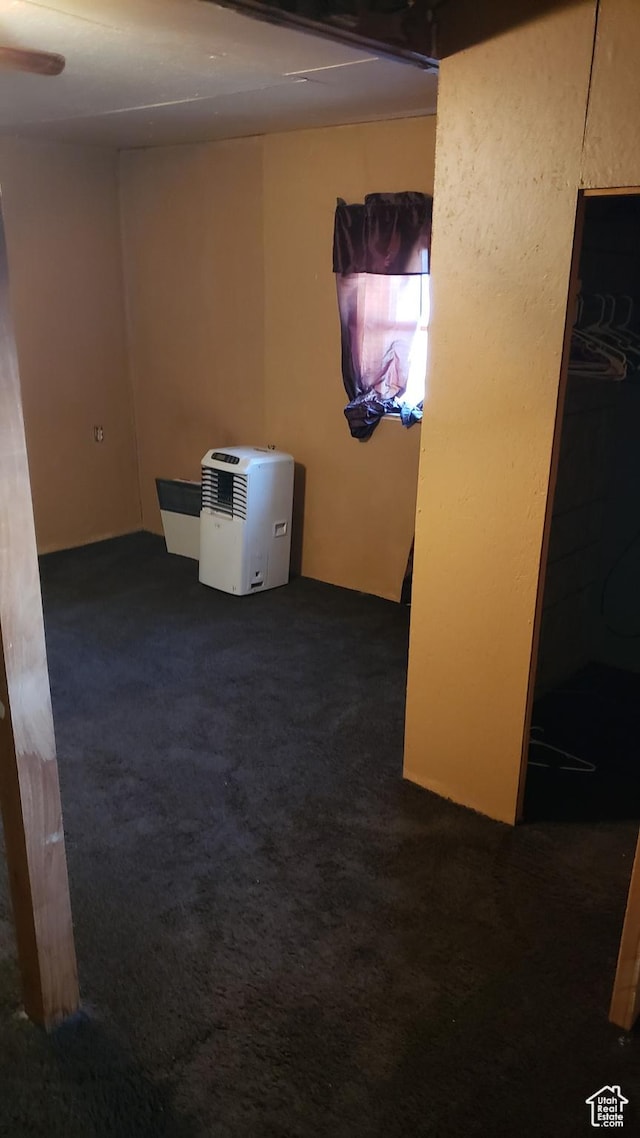 449 E 3rd S, Price, UT 84501 - spare room with dark colored carpet