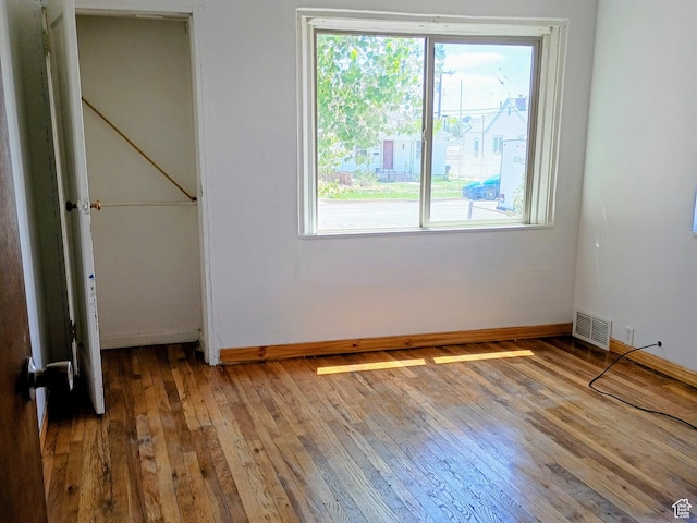 449 E 3rd S, Price, UT 84501 - empty room with hardwood / wood-style flooring and baseboards