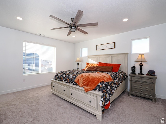 1766 E Johnstown Rd N Unit 710, Eagle Mountain, UT 84005 - bedroom featuring recessed lighting, visible vents, multiple windows, and carpet