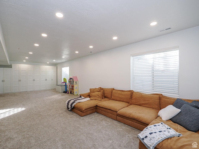 1766 E Johnstown Rd N Unit 710, Eagle Mountain, UT 84005 - carpeted living area featuring recessed lighting and visible vents