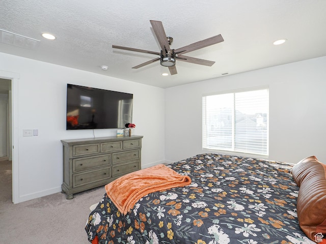 1766 E Johnstown Rd N Unit 710, Eagle Mountain, UT 84005 - bedroom with a ceiling fan, light colored carpet, visible vents, baseboards, and recessed lighting