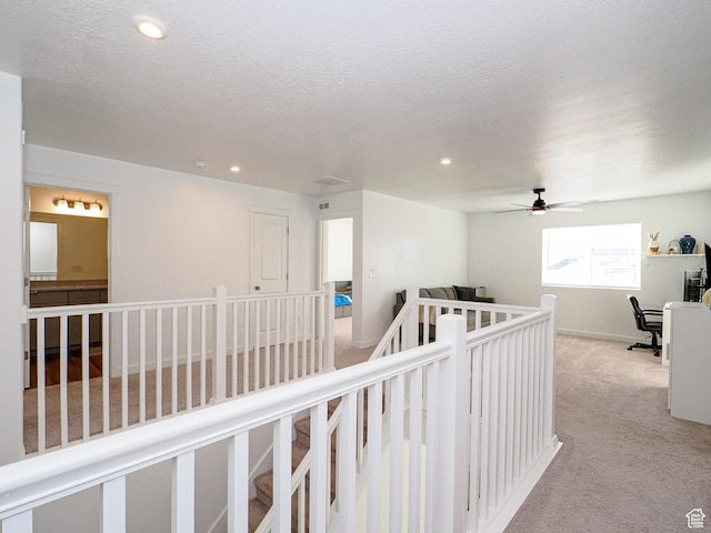 1766 E Johnstown Rd N Unit 710, Eagle Mountain, UT 84005 - corridor featuring recessed lighting, baseboards, light carpet, and an upstairs landing
