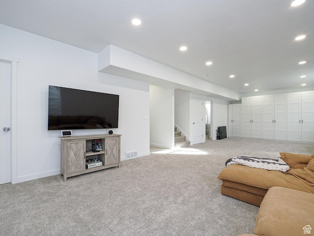 1766 E Johnstown Rd N Unit 710, Eagle Mountain, UT 84005 - living room with carpet floors, recessed lighting, stairs, and baseboards