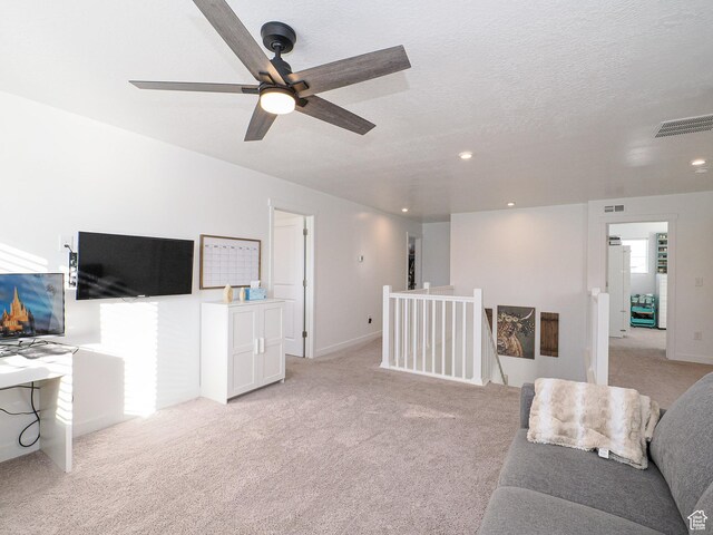 1766 E Johnstown Rd N Unit 710, Eagle Mountain, UT 84005 - living area with a ceiling fan, light colored carpet, recessed lighting, and visible vents