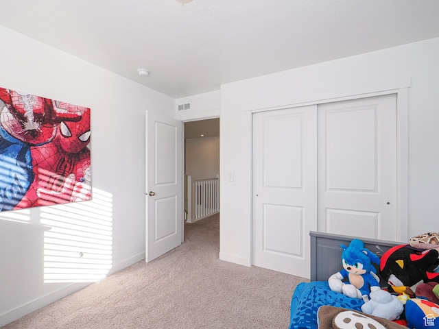 1766 E Johnstown Rd N Unit 710, Eagle Mountain, UT 84005 - carpeted bedroom with visible vents, baseboards, and a closet
