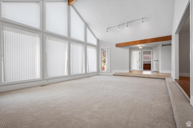 1790 N 120 E, Orem, UT 84057 - unfurnished living room with beamed ceiling, track lighting, high vaulted ceiling, and light carpet