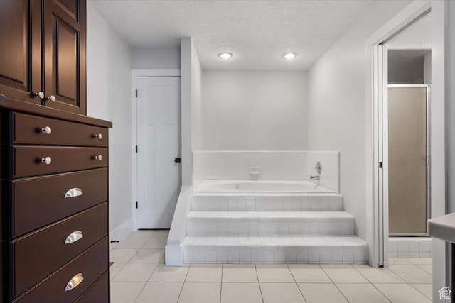 1790 N 120 E, Orem, UT 84057 - bathroom featuring independent shower and bath, tile patterned flooring, and a textured ceiling