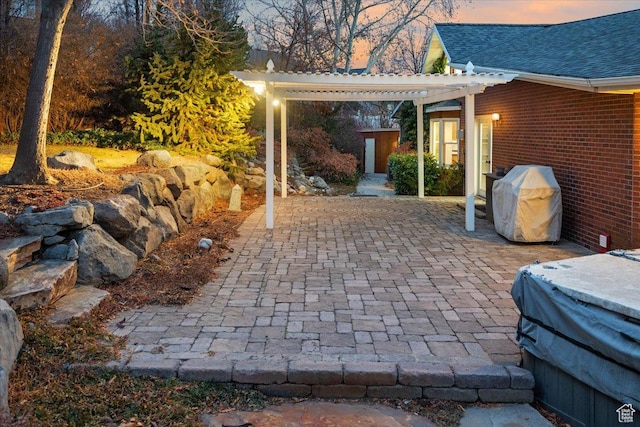 1790 N 120 E, Orem, UT 84057 - patio terrace at dusk with a grill, a shed, and a pergola