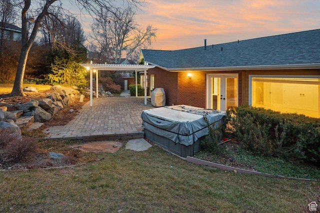 1790 N 120 E, Orem, UT 84057 - back house at dusk with a patio, a yard, and a pergola