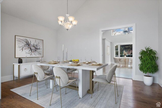 1790 N 120 E, Orem, UT 84057 - dining room with dark hardwood / wood-style floors, high vaulted ceiling, and a notable chandelier