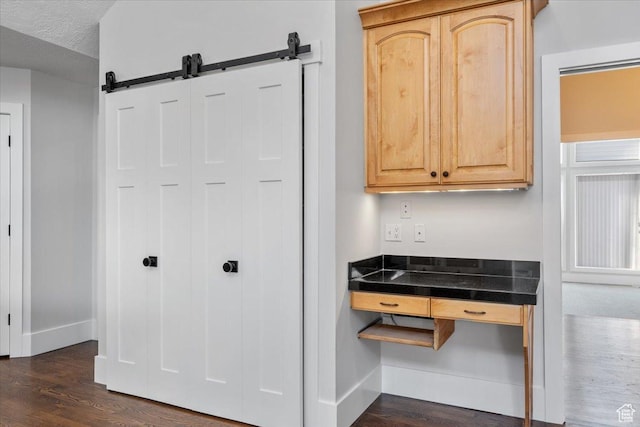 1790 N 120 E, Orem, UT 84057 - kitchen featuring dark wood-type flooring, a barn door, a textured ceiling, and light brown cabinets