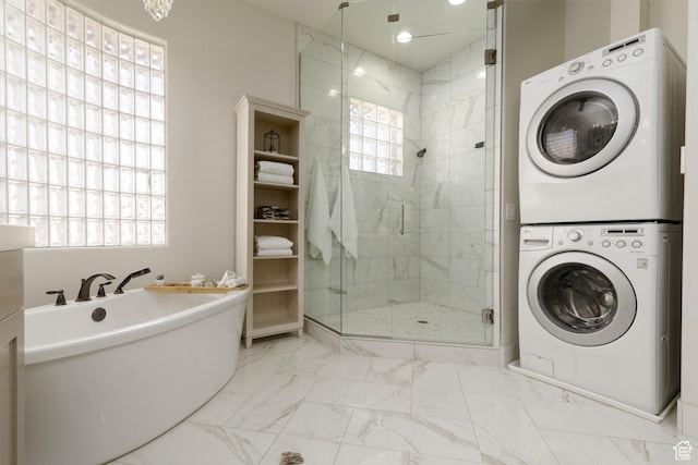 1783 N Firerock Cir, Washington, UT 84780 - bathroom featuring independent shower and bath and stacked washing maching and dryer